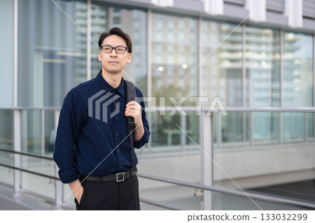 A man walking in the city A man walking in the city 133032299