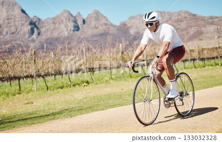 Man, mountains and bicycle in nature, field and training for triathlon sports in Cape Town. Cyclist, bike and cycling on off road path outdoor for fitness, exercise and power performance in sunshine Man, mountains and bicycle in nature, field and training for triathlon sports in Cape Town. Cyclist, bike and cycling on off road path outdoor for fitness, exercise and power performance in sunshine 133032328