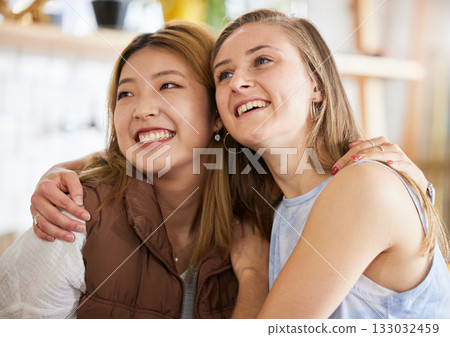 Smile, friendship and women hugging in cafe, happy, love and weekend fun for asian woman and friend. Hug, laugh and diversity, smiling friends embrace and relax in restaurant for brunch date at table Smile, friendship and women hugging in cafe, happy, love and weekend fun for asian woman and friend. Hug, laugh and diversity, smiling friends embrace and relax in restaurant for brunch date at table 133032459