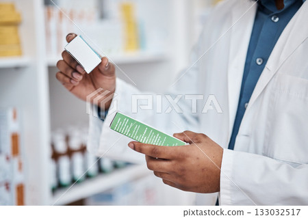 Pharmacy check, black man hands and medicine ingredients checking and pills. Pharmacist, drugs search and pharmaceutical products in a retail shop or clinic with healthcare and wellness employee Pharmacy check, black man hands and medicine ingredients checking and pills. Pharmacist, drugs search and pharmaceutical products in a retail shop or clinic with healthcare and wellness employee 133032517