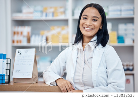 Pharmacy portrait, medicine package and pharmacist in drugs store, pharmaceutical shop or healthcare dispensary. Hospital retail manager, pills stock product and happy medical woman for help support 133032523