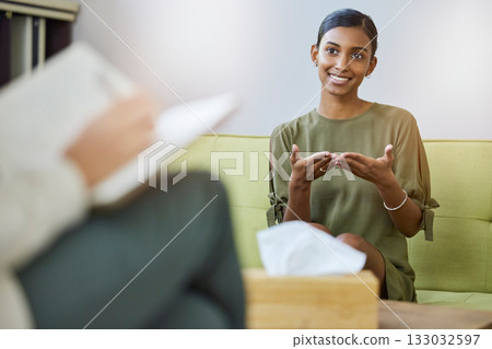 Therapy, psychology and young woman talking of help, support or mental health solution and therapist writing notes. Counseling service, progress and psychologist with indian patient, client or person Therapy, psychology and young woman talking of help, support or mental health solution and therapist writing notes. Counseling service, progress and psychologist with indian patient, client or person 133032597