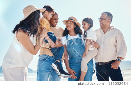 Kids, beach and summer with a black family together outdoor on the sand by the ocean or sea for holiday. Children, love or nature with siblings, parents and grandparents bonding outside on the coast Kids, beach and summer with a black family together outdoor on the sand by the ocean or sea for holiday. Children, love or nature with siblings, parents and grandparents bonding outside on the coast 133032684