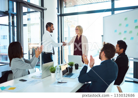 Congratulations, handshake and professional with support at a meeting for teamwork and collaboration at a company. Business people, applause and presentation with success for agreement in office. Congratulations, handshake and professional with support at a meeting for teamwork and collaboration at a company. Business people, applause and presentation with success for agreement in office. 133032686