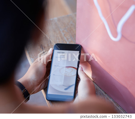 Website, reading and the phone screen of a woman with a menu, food decision or coffee choice. Online, lunch and a girl with a mobile app of a restaurant for hunger, snack or a meal at a cafe Website, reading and the phone screen of a woman with a menu, food decision or coffee choice. Online, lunch and a girl with a mobile app of a restaurant for hunger, snack or a meal at a cafe 133032743