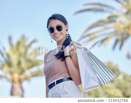 Woman with shopping bag, outdoor mall and retail, fashion and happy customer with freedom in city. Luxury with sale, discount and deal at boutique, female with smile for store product and commerce Woman with shopping bag, outdoor mall and retail, fashion and happy customer with freedom in city. Luxury with sale, discount and deal at boutique, female with smile for store product and commerce 133032788