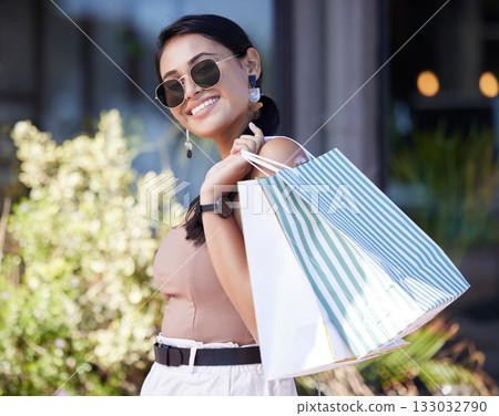 Woman with shopping bag, retail and fashion with outdoor mall, happy customer with freedom in city. Luxury with sale, discount and deal at boutique, female with smile for store product and commerce Woman with shopping bag, retail and fashion with outdoor mall, happy customer with freedom in city. Luxury with sale, discount and deal at boutique, female with smile for store product and commerce 133032790