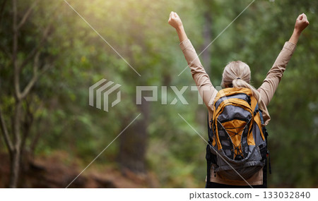 Back of woman, hiking and arms of freedom, success and hope of courage, achievement and mockup. Hiker celebrate travel, motivation and inspiration of goals, wellness and energy of adventure in forest Back of woman, hiking and arms of freedom, success and hope of courage, achievement and mockup. Hiker celebrate travel, motivation and inspiration of goals, wellness and energy of adventure in forest 133032840