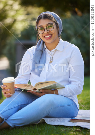 Books, portrait and happy woman at park, university campus or outdoor distance learning, studying and reading. Muslim, islamic or arabic student with education book for research or college knowledge Books, portrait and happy woman at park, university campus or outdoor distance learning, studying and reading. Muslim, islamic or arabic student with education book for research or college knowledge 133032842