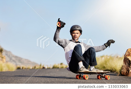 Skateboard, slide and man in road for sports competition, fitness training and exercise on mountain. Skating, skateboarding and male skater riding for speed, adventure and freedom for sport challenge 133033063