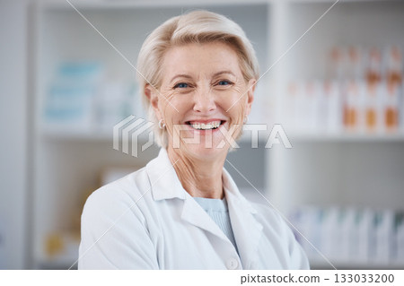 Pharmacy, pharmacist portrait and smile of woman in drugstore or medicine shop. Healthcare, wellness face and happy, proud and confident senior medical professional from Canada laughing for career. Pharmacy, pharmacist portrait and smile of woman in drugstore or medicine shop. Healthcare, wellness face and happy, proud and confident senior medical professional from Canada laughing for career. 133033200