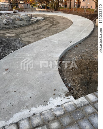 Winding Concrete Path Under Construction 133033220