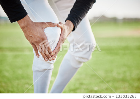 Baseball, pain and hands with knee injury on field after accident, fall or workout in match. Sports, training and player man with fibromyalgia, inflammation or broken leg, arthritis or tendinitis. 133033265
