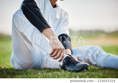 Baseball player, shoes and ankle pain, man with sport injury and emergency, first aid and need medical care outdoor. Accident, muscle tension and inflammation with male on sports field and fitness 133033324