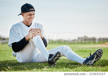 Baseball, pain and man with knee injury on field after accident, fall or workout in match. Sports, training and male athlete with fibromyalgia, inflammation or broken leg, arthritis or tendinitis. 133033327