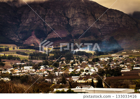 Urban development, suburb or cityscape by mountain, buildings and housing in Cape Town. Outdoor, landscape and mountains with houses, night and hill for real estate, property or holiday by skyline Urban development, suburb or cityscape by mountain, buildings and housing in Cape Town. Outdoor, landscape and mountains with houses, night and hill for real estate, property or holiday by skyline 133033416