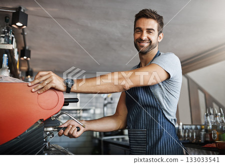 Man in cafe, machine for coffee and barista, prepare caffeine drink with process and production in hospitality industry. Service, male waiter working on espresso in restaurant and smile in portrait 133033541