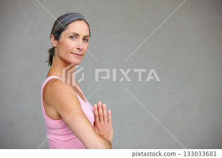 Yoga, portrait and elderly woman in praying pose in studio health, balance and exercise on wall background. Face, meditation and mature lady calm with zen for workout and training on space for mockup Yoga, portrait and elderly woman in praying pose in studio health, balance and exercise on wall background. Face, meditation and mature lady calm with zen for workout and training on space for mockup 133033681