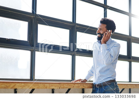 Window, smile and phone call with a business man thinking about the future success of his company in the office. Happy, mindset and communication with a male employee chatting on his mobile at work Window, smile and phone call with a business man thinking about the future success of his company in the office. Happy, mindset and communication with a male employee chatting on his mobile at work 133033698
