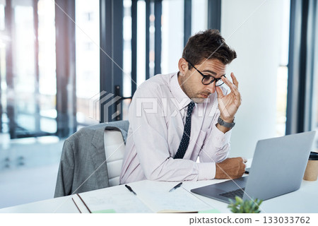 Headache, anxiety and man on laptop in office frustrated with glitch, mistake or crisis. Stress, burnout and male business person angry with fail, 404 or bad review, deadline report or tech delay 133033762