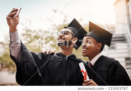 Friends, graduation and selfie of a college students with a diploma and smile outdoor. Men happy to celebrate university achievement, education success and future at school event with graduate memory Friends, graduation and selfie of a college students with a diploma and smile outdoor. Men happy to celebrate university achievement, education success and future at school event with graduate memory 133033767