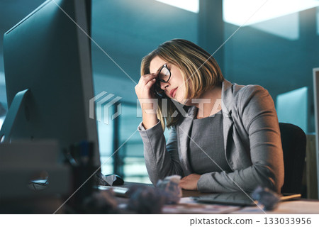 Sick, headache and business woman in office, tired or fatigue while working late at night on computer. Burnout, migraine and female person with depression, anxiety or brain fog, stress and deadline. 133033956