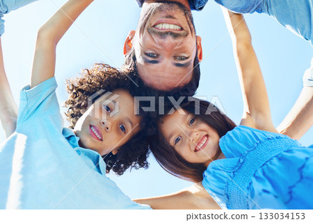Hug, blue sky portrait and happy kids, father and children bonding, support and family circle for care, solidarity or love. Group, bottom view and people together for Fathers Day, happiness and trust Hug, blue sky portrait and happy kids, father and children bonding, support and family circle for care, solidarity or love. Group, bottom view and people together for Fathers Day, happiness and trust 133034153