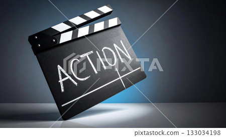 Clapperboard displaying action word for film production Clapperboard displaying action word for film production 133034198