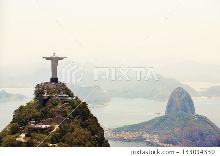 Landscape, monument and aerial of Christ the Redeemer for tourism, sightseeing and travel destination. Traveling, Rio de Janeiro and drone view of statue, sculpture and Brazil landmark on mountain 133034330