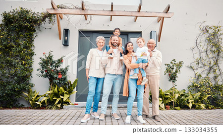 Portrait of generations of family outside new home, real estate, investment and mortgage with security. Happy grandparents, parents and children standing together, homeowners with smile and happiness 133034355