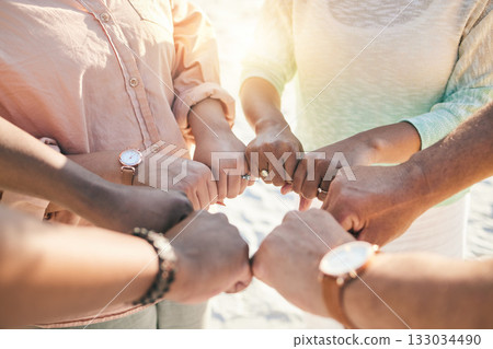 Group of people fist bump together for teamwork, community support and collaboration with outdoor games. Circle of friends closeup with power, collaboration and solidarity hand sign for power Group of people fist bump together for teamwork, community support and collaboration with outdoor games. Circle of friends closeup with power, collaboration and solidarity hand sign for power 133034490