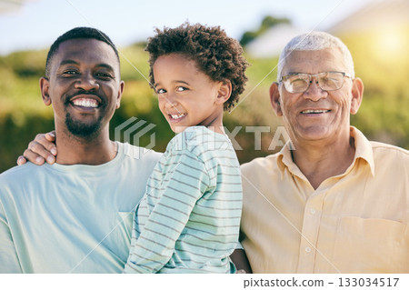 Portrait, black family with a father, son and grandfather bonding outdoor in the garden together for love. Happy, kids or generations with a man, boy and senior relative standing outisde in the yard 133034517