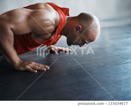 Strong, muscle and man doing floor push up for sports endurance, determination or body fitness commitment. Bodybuilder profile, health mindset or active person workout, bodybuilding or floor exercise Strong, muscle and man doing floor push up for sports endurance, determination or body fitness commitment. Bodybuilder profile, health mindset or active person workout, bodybuilding or floor exercise 133034677