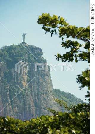 Brazil, monument and Christ the Redeemer on mountain for tourism, sightseeing and travel destination. Traveling, global architecture and statue, sculpture and city landmark on Rio de Janeiro on hill 133034678