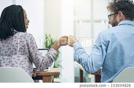 Back, teamwork and fist bump with business people in their office, working together on a company project. Motivation, collaboration and hand gesture with colleagues celebrating success at work 133034826