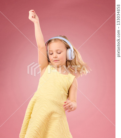 Music headphones, dance and girl kids in studio, pink background or color backdrop for happiness. Happy children, dancing and listening to radio, audio and sound with energy, fun songs and freedom Music headphones, dance and girl kids in studio, pink background or color backdrop for happiness. Happy children, dancing and listening to radio, audio and sound with energy, fun songs and freedom 133034858