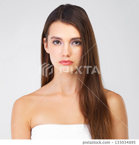 Beauty, skincare and hair, portrait of woman in studio isolated on white background salon cosmetics. Serious face of beautiful model from Portugal, spa facial and treatment for fresh, clean skin glow 133034895