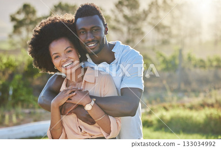 Couple, black people and hug in park portrait with smile, sunshine and happiness for romantic love. Young black man, black woman and bonding embrace on summer adventure, relax and outdoor in Atlanta Couple, black people and hug in park portrait with smile, sunshine and happiness for romantic love. Young black man, black woman and bonding embrace on summer adventure, relax and outdoor in Atlanta 133034992