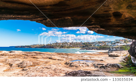Tamarama coastal cliffs and walking track with blue ocean view Tamarama coastal cliffs and walking track with blue ocean view 133035034