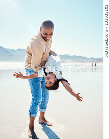 Family, beach and father carry girl playing by ocean for bonding, quality time and relaxing on weekend. Love, nature and happy dad holding child on summer holiday, vacation and adventure together Family, beach and father carry girl playing by ocean for bonding, quality time and relaxing on weekend. Love, nature and happy dad holding child on summer holiday, vacation and adventure together 133035102