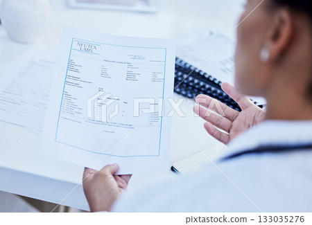 Paperwork, test and doctor with results on document or paper working in office reading prescription in a hospital. Clinic, medicine and medical healthcare professional or worker with insurance 133035276