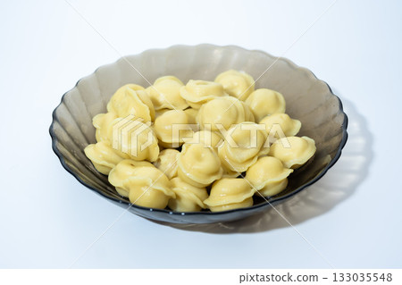 Glass Bowl with Boiled Dumplings on Light Glass Bowl with Boiled Dumplings on Light 133035548