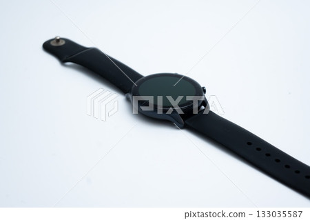 Black smart watch with blank screen on white background for sport and technology Black smart watch with blank screen on white background for sport and technology 133035587