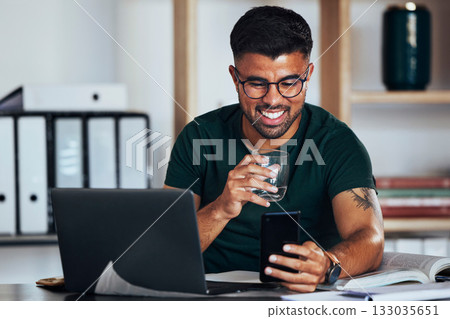 Business, happy and man drinking water with a phone for communication, social media and a meme. Smile, working and employee reading a funny chat, message or notification on a mobile app with a drink Business, happy and man drinking water with a phone for communication, social media and a meme. Smile, working and employee reading a funny chat, message or notification on a mobile app with a drink 133035651