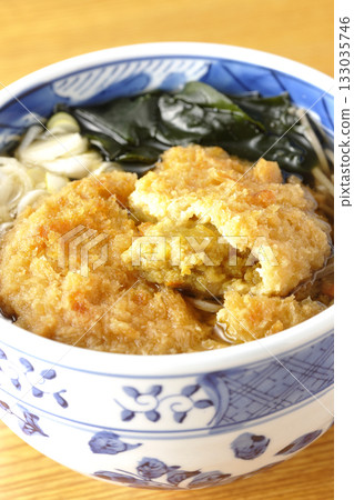 Soba noodles topped with croquettes 133035746