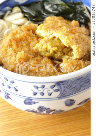 Soba noodles topped with croquettes 133035748