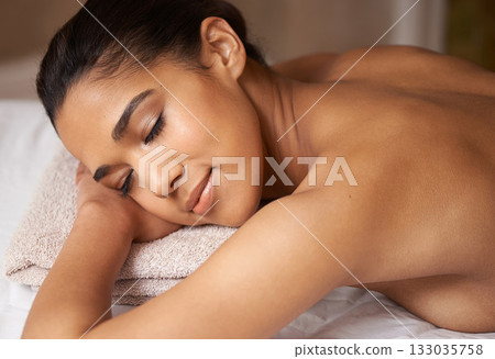 Woman, sleeping or back massage in spa to relax for zen resting or wellness physical therapy in luxury resort. Calm girl in salon to exfoliate for body healing treatment or holistic detox therapy 133035758