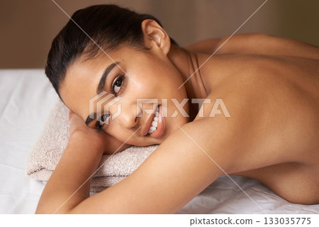 Portrait of woman, happy or massage to relax for zen resting or wellness physical therapy in spa hotel. Face of girl smiling in salon to exfoliate for body healing treatment or holistic detox therapy 133035775