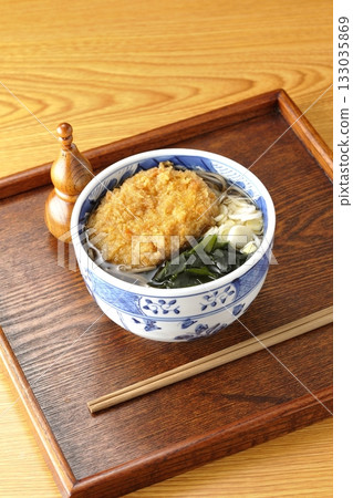 Soba noodles topped with croquettes 133035869