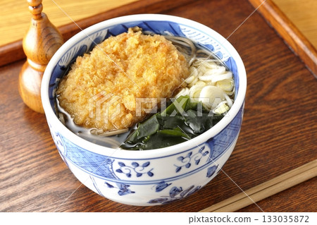 Soba noodles topped with croquettes Soba noodles topped with croquettes 133035872